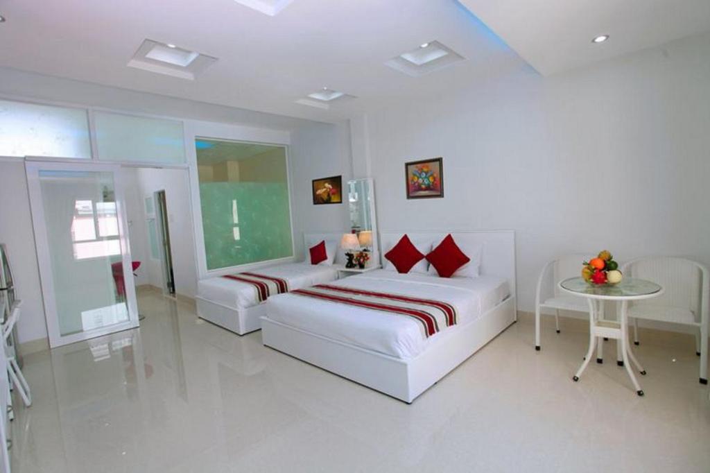 Апартаменты (Улучшенные трехместные апартаменты с окном), An Phu Gia Apartment