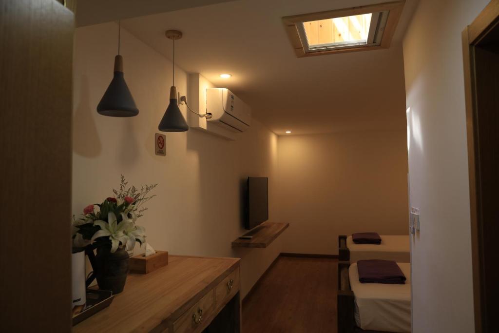 Двухместный (Двухместный номер Делюкс с 2 отдельными кроватями), Beijing Downtown Backpackers Accommodation