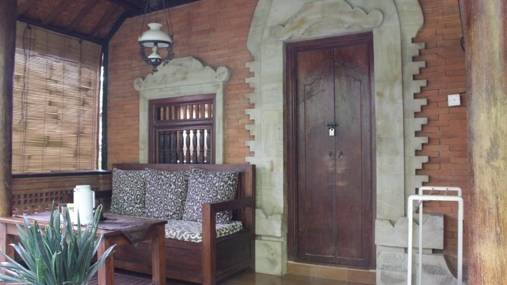 Двухместный (Стандартный двухместный номер с 1 кроватью или 2 отдельными кроватями и вентилятором), Gerhana Sari 2 Bungalows