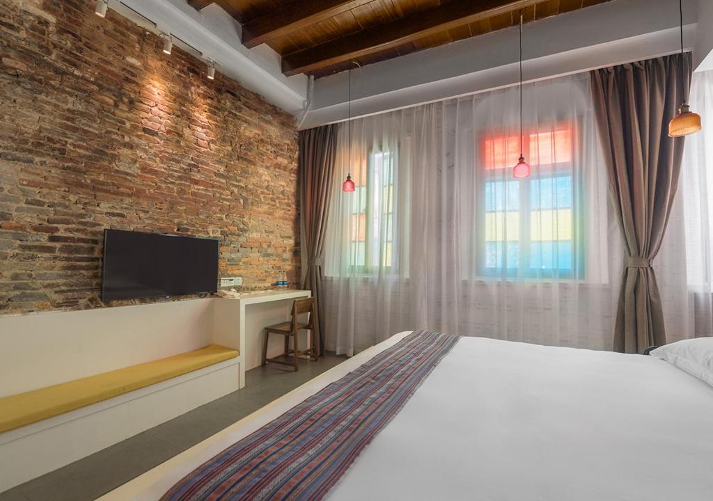 Двухместный (Семейный номер Делюкс «720°»), Qilou Huanke Boutique Hotel