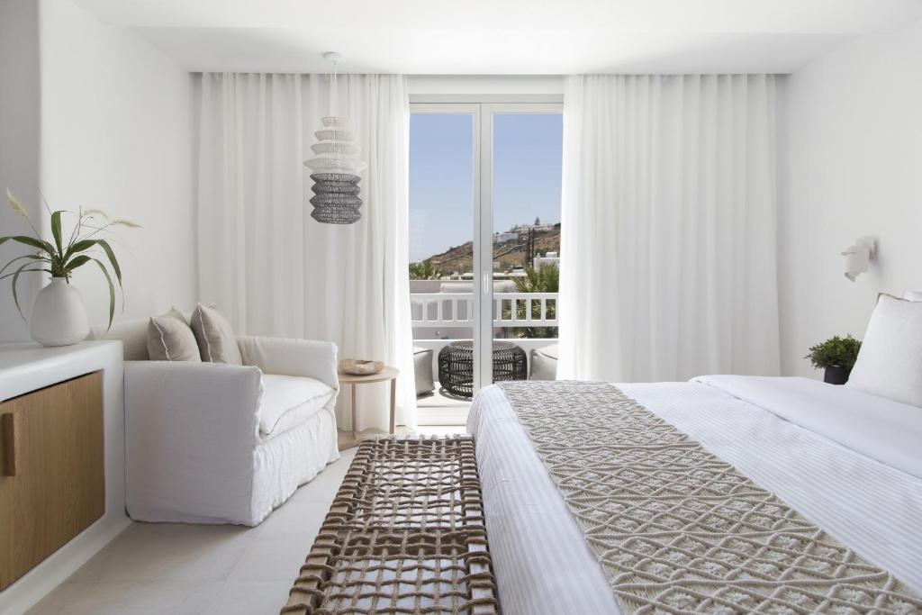 Adorno Beach Hotel & Suites - Tap to explore photos