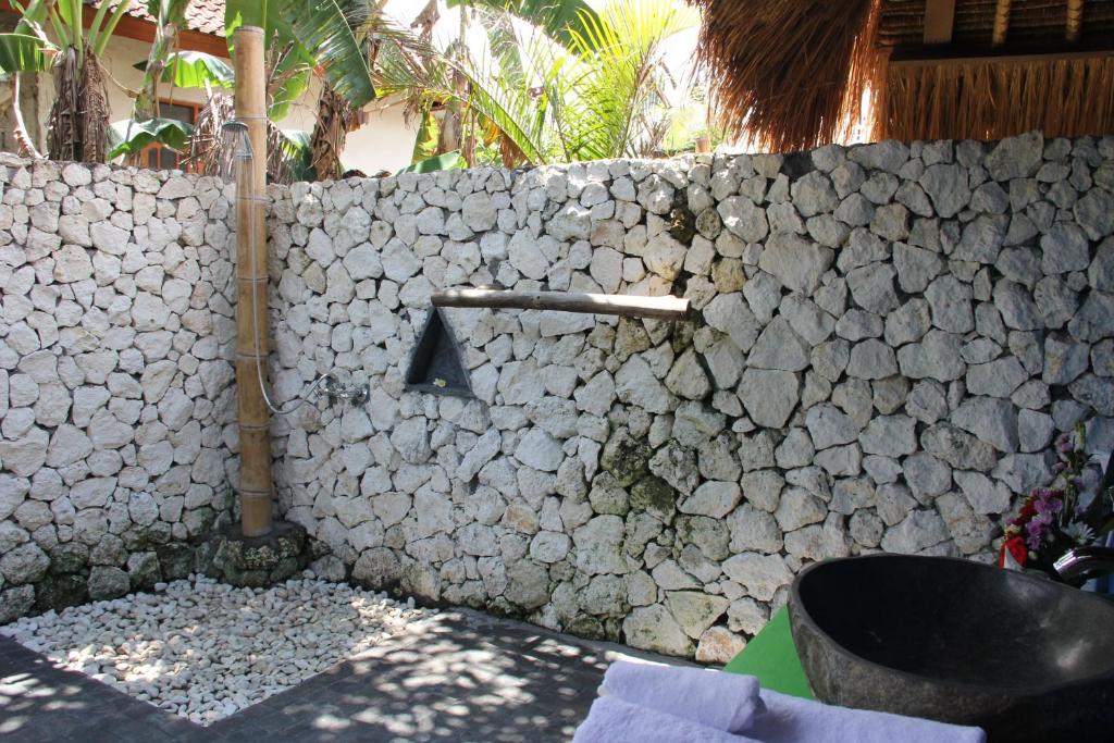 Номер (Двухместное бунгало Делюкс с 1 кроватью), The Calmtree Bungalows