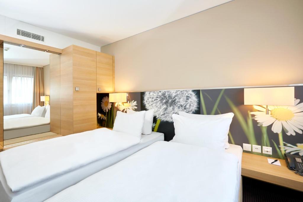 Двухместный (Двухместный номер «Комфорт» с 2 отдельными кроватями), H+ Hotel Zürich