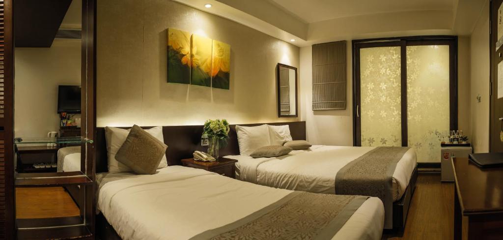 Трехместный (Улучшенный трехместный номер), Dragon Pearl Hotel