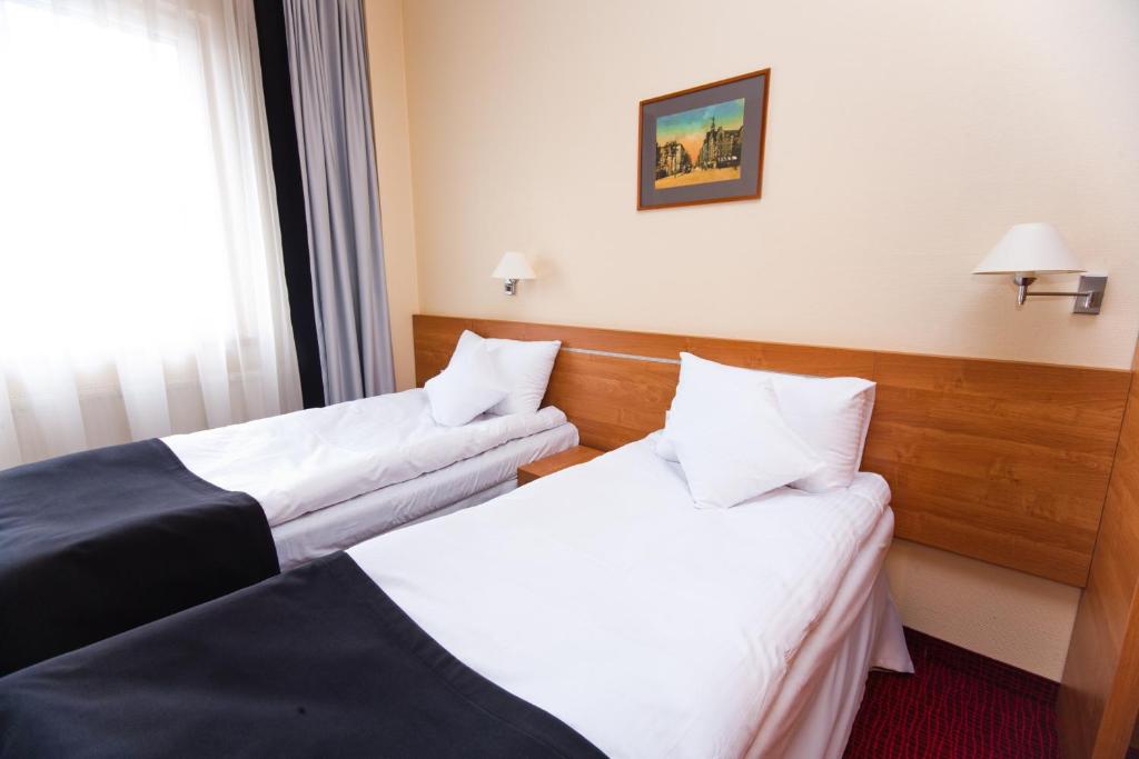 Hotel Malinowski Business - Tap to explore photos