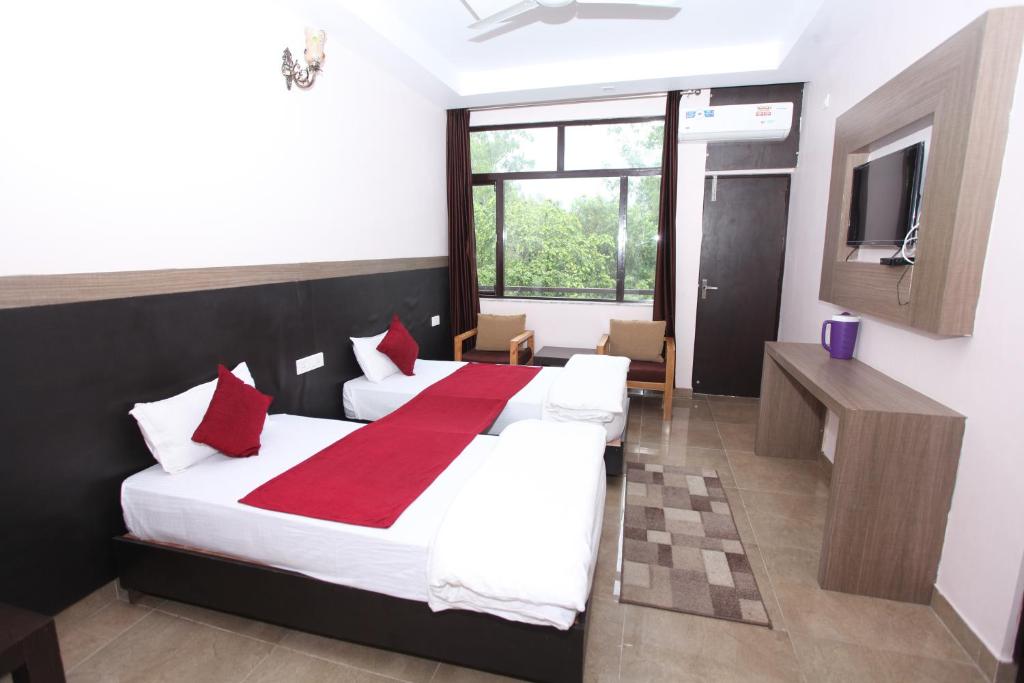 Двухместный (Двухместный номер Делюкс с 2 отдельными кроватями), Hotel Trihari
