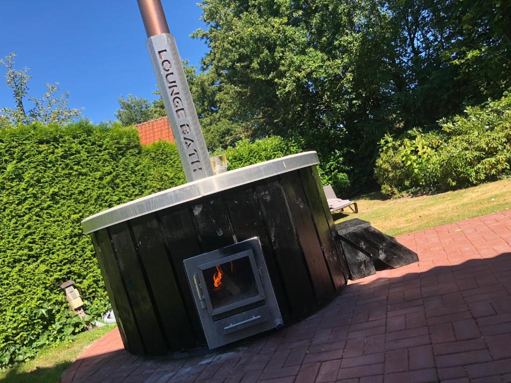 De Brittenburg met privé hottub & sauna 4-persoons photo 2