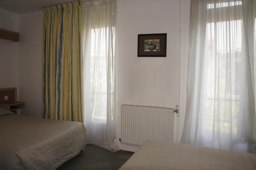 Двухместный (Двухместный номер с 2 отдельными кроватями), Hôtel Edgar Quinet