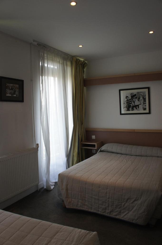 Двухместный (Двухместный номер с 2 отдельными кроватями), Hôtel Edgar Quinet