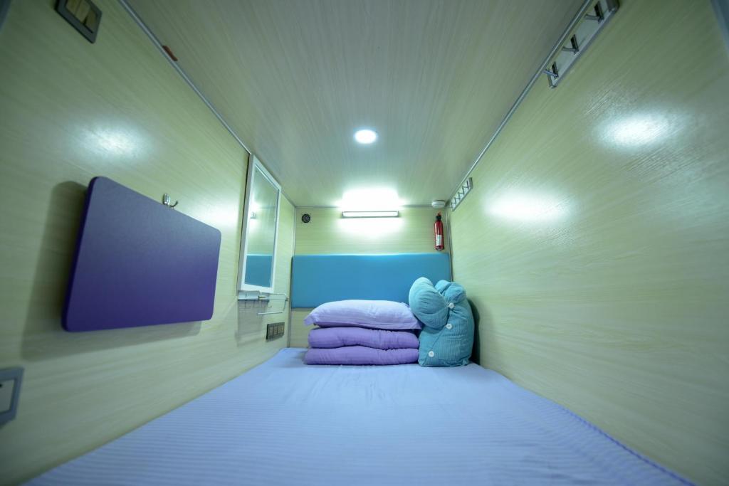 Номер (Односпальная кровать в общем номере - Qingshan), Qingting Space Capsule Hostel