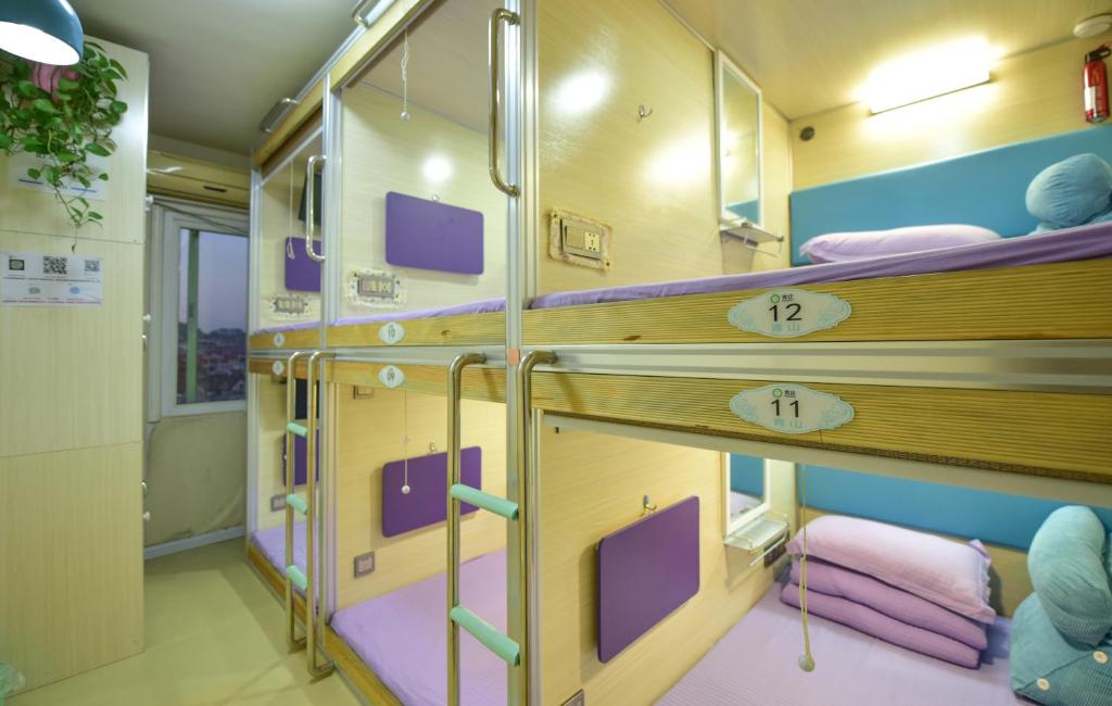 Номер (Односпальная кровать в общем номере - Qingshan), Qingting Space Capsule Hostel