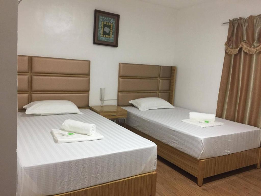 Двухместный (Двухместный номер Делюкс с 2 отдельными кроватями), Meaco Royal Hotel - Tayuman