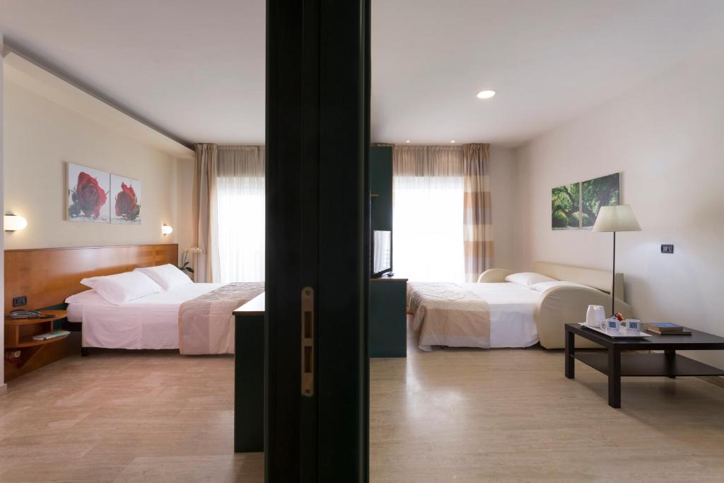 Astoria Suite Hotel - Tap to explore photos