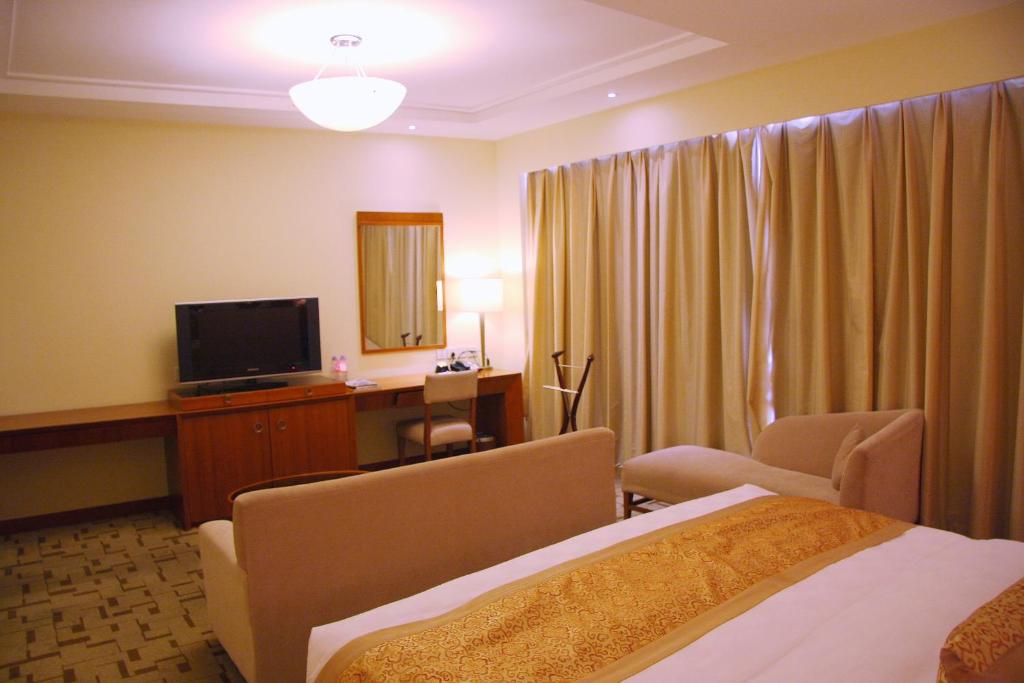 Двухместный (Представительский двухместный номер с 1 кроватью), Jian Guo Garden Hotel