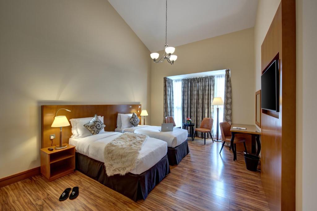 {
  "en-gb": "J5 Villas Holiday Homes Barsha Gardens"
} photo 4