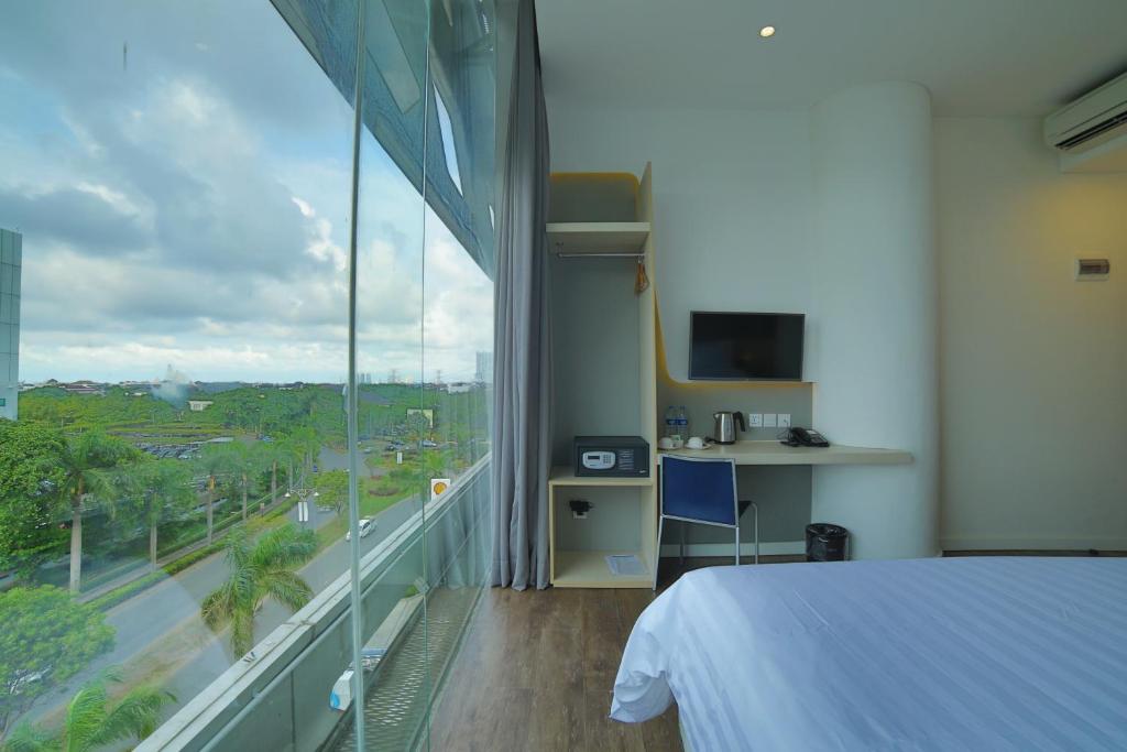 Двухместный (Двухместный номер Делюкс с 1 кроватью), Ozone Hotel Pantai Indah Kapuk