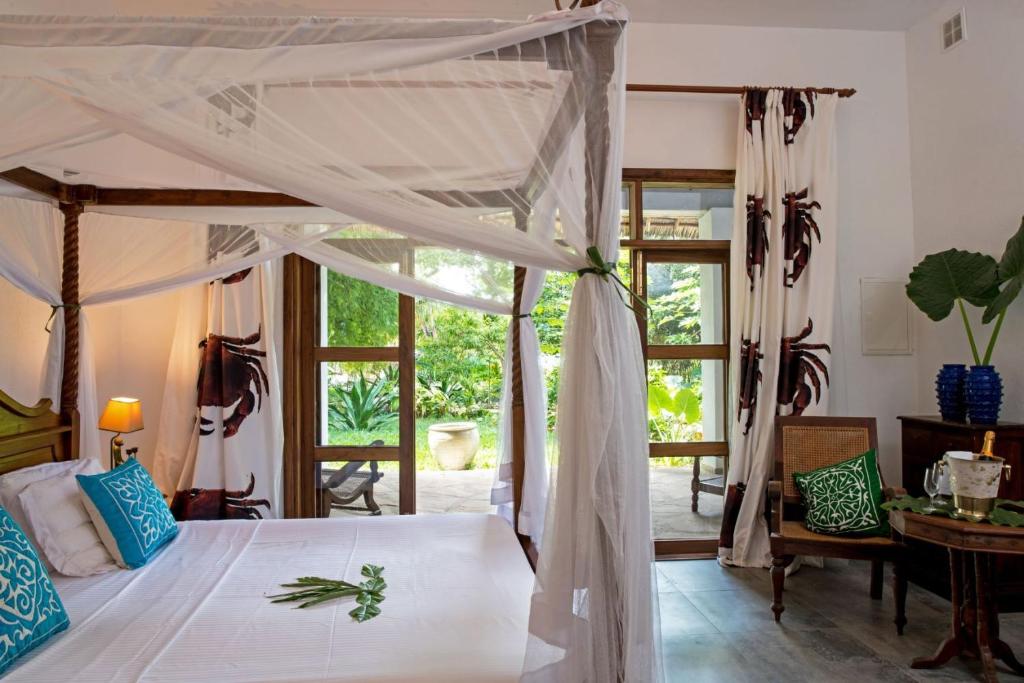 Tikitam Palms Boutique Hotel - Tap to explore photos