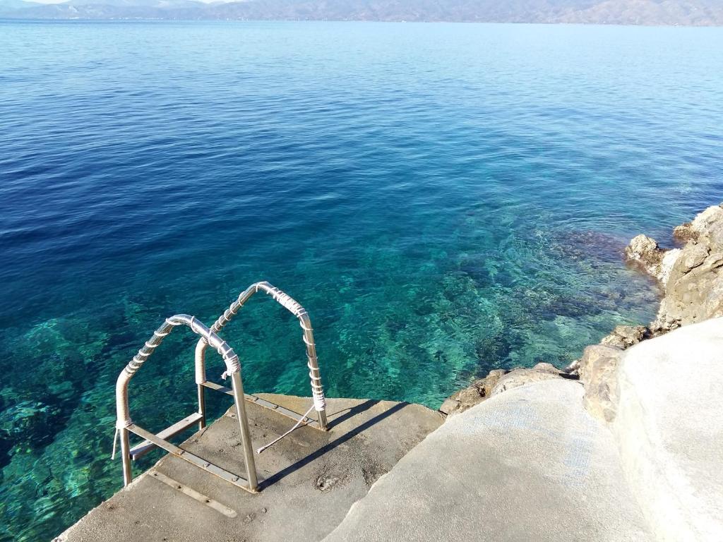 Ecloge, Hydra Island - Tap to explore photos