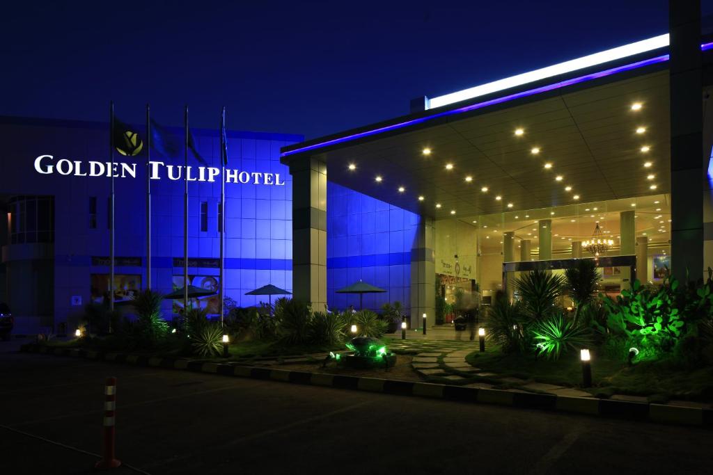Golden Tulip Hail - Tap to explore photos