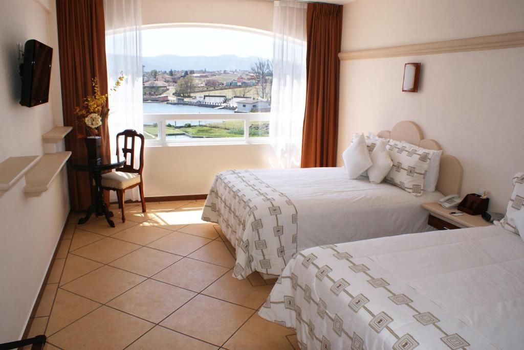 Hotel 9 Manantiales photo 4