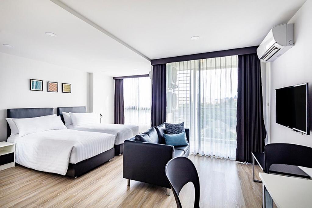 Двухместный (Двухместный номер с 2 отдельными кроватями), The Rizin Hotel & Residences
