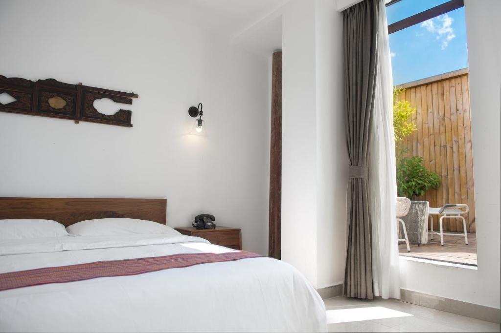 Двухместный (Стандартный номер «90°» с кроватью размера «queen-size»), Qilou Huanke Boutique Hotel