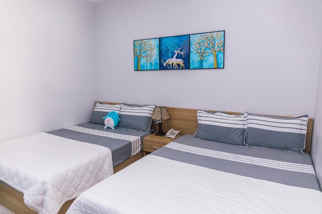 Апартаменты (Номер-студио Делюкс с 2 кроватями и балконом), An Phu Gia Apartment