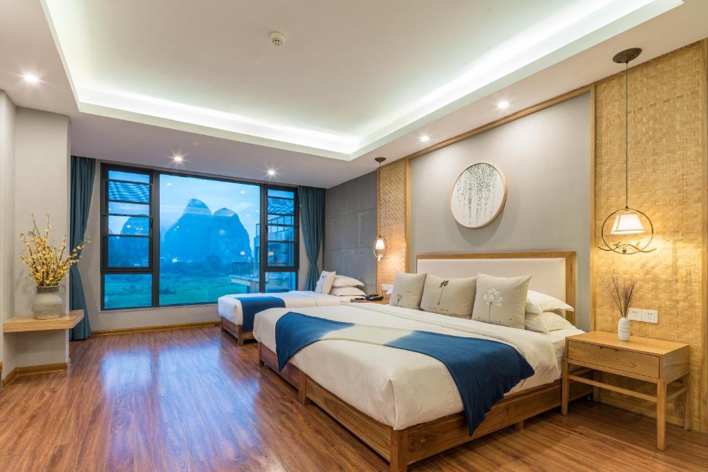 Семейный (Family Room with Tatami Area free afternoon tea available), Yangshuo Zen Garden Resort