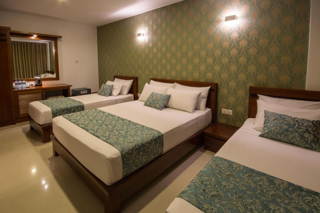 Семейный (Deluxe Family Room with Free 24 hours Check in & Check out), Ceyloni Inn