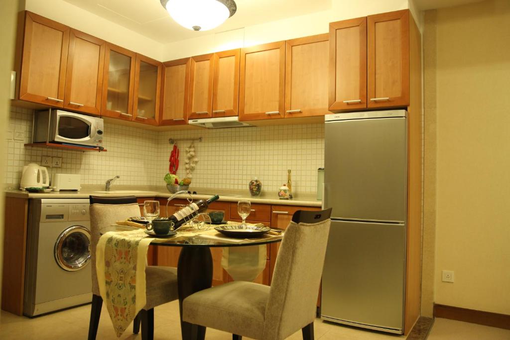 Сьюит (Представительский люкс с 1 спальней), Somerset Harbour Court Dalian