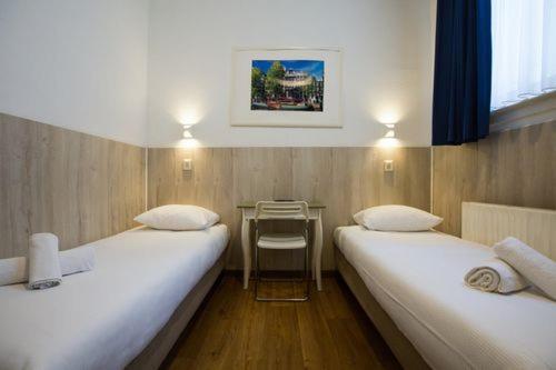 Двухместный (Небольшой двухместный номер с 2 отдельными кроватями), Hotel Titus City Centre