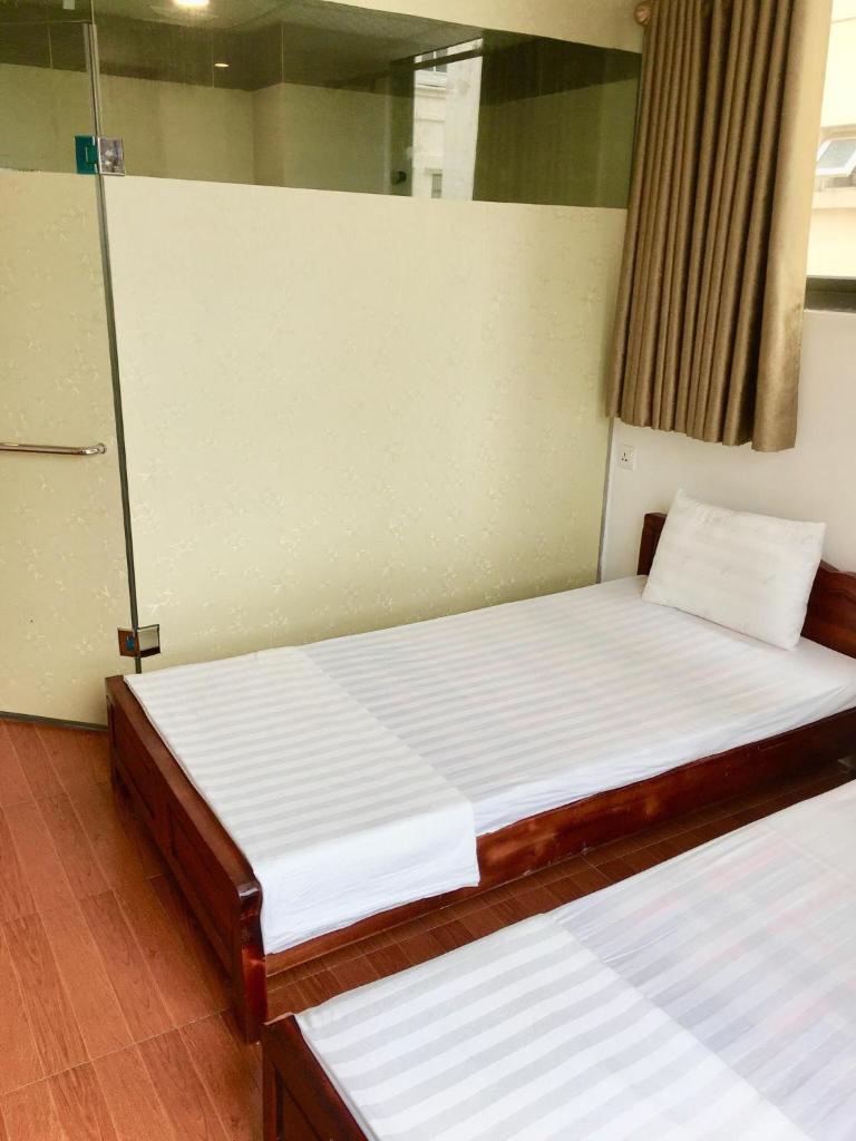Трехместный (Улучшенный трехместный номер), van minh hotel