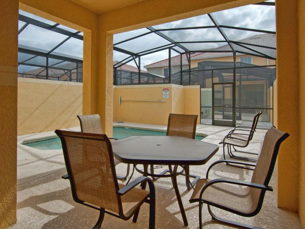 Paradise Palms- 4 Bed Townhome W/splashpool-3202pp 4 Bedroom Townhouse by RedAwning image