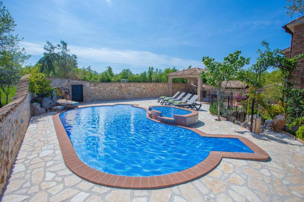 Manuel with Swimming Pool photo 1