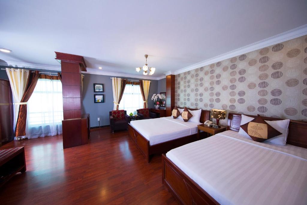 Трехместный (Трехместный номер Делюкс с видом на город), Shangri La saigon hotel
