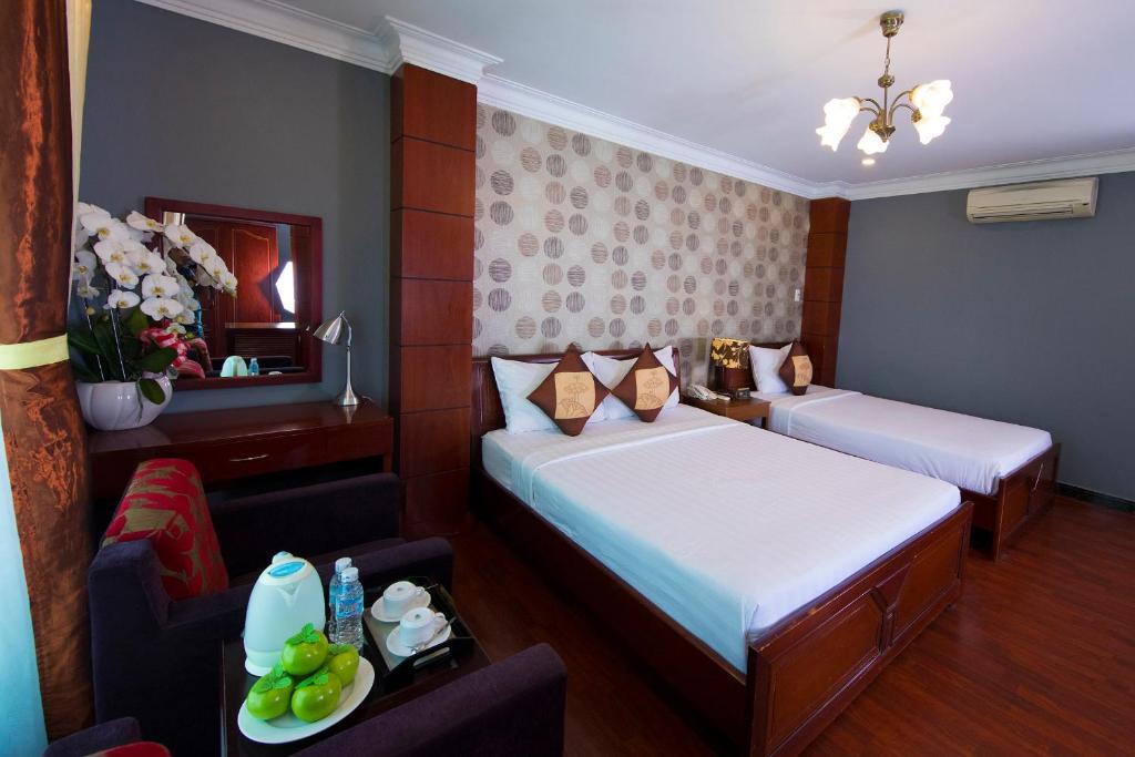 Трехместный (Трехместный номер Делюкс с видом на город), Shangri La saigon hotel