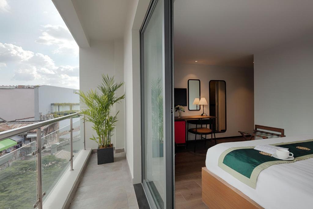 Двухместный (Двухместный номер Делюкс с 1 кроватью), Little Saigon Boutique Hotel
