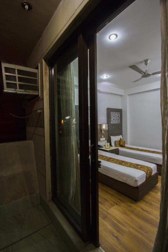 Двухместный (Двухместный номер с 1 кроватью или 2 отдельными кроватями), FabHotel Sunstar Karol Bagh