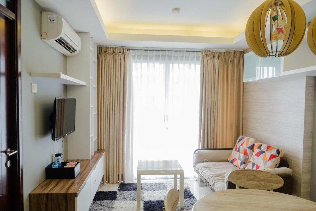 Pleasant 2BR Apartment at Gateway Pasteur By Travelio - Tap to explore photos