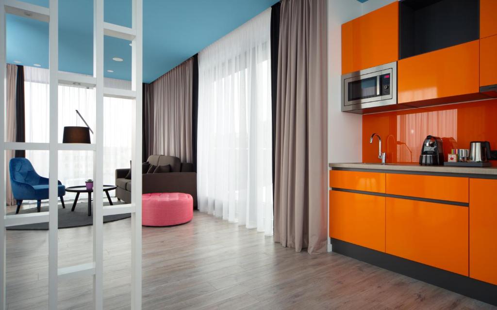 Апартаменты (Улучшенные апартаменты с 1 спальней и террасой), Park Inn by Radisson Residence Riga Barona