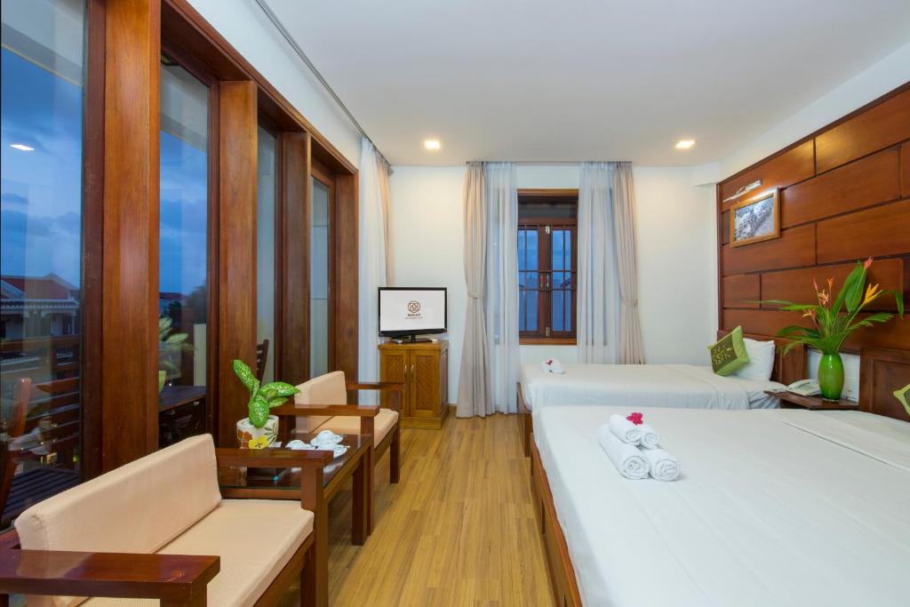 Kiman Hoi An Hotel - Tap to explore photos