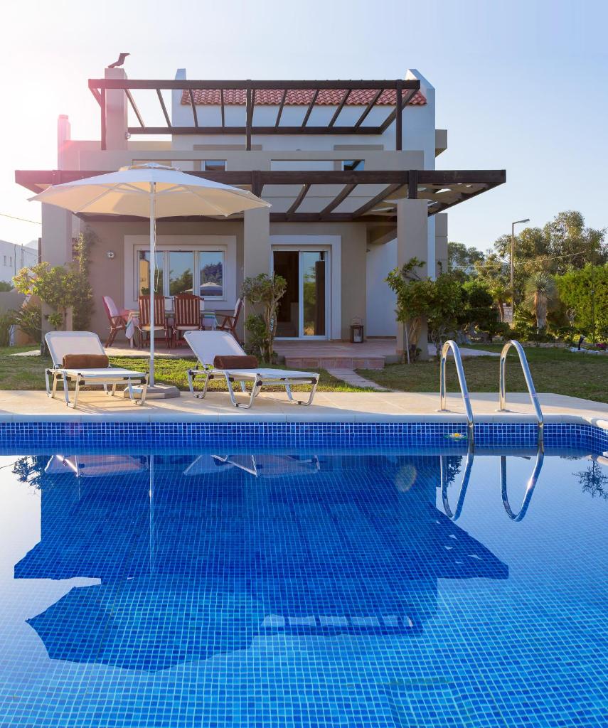 Evergreen Seaside Villa with private pool photo 1