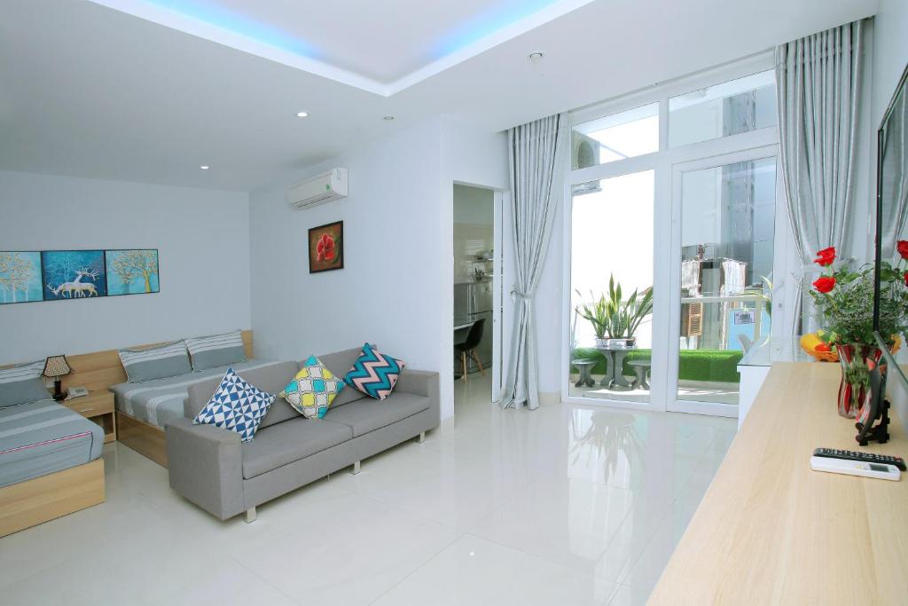 Апартаменты (Номер-студио Делюкс с 2 кроватями и балконом), An Phu Gia Apartment