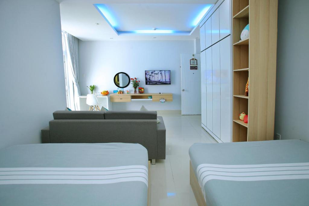 Апартаменты (Номер-студио Делюкс с 2 кроватями и балконом), An Phu Gia Apartment