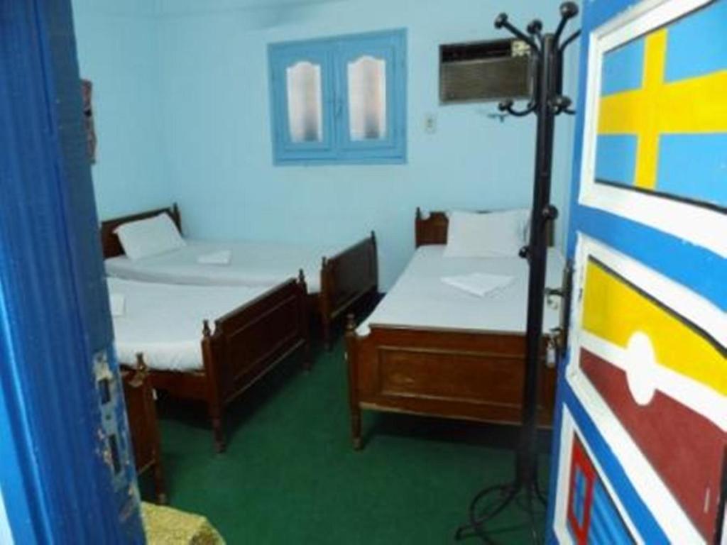 Четырехместный (Четырехместный номер с общей ванной комнатой), Bob Marley House Sherief Hotel Luxor