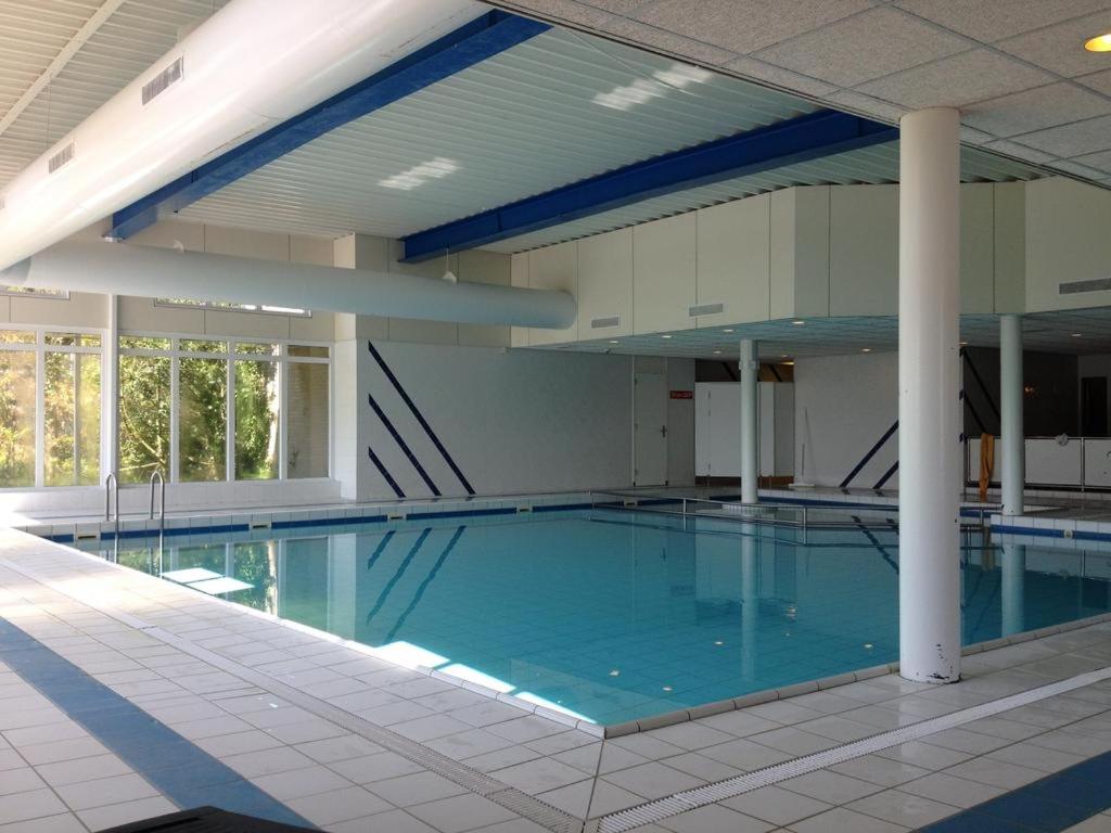 Gezellige App STRANDHUYS en DE VUURTOREN, beg grond met Prive TERRAS -eigen KEUKEN - Incl Verwarmd Binnen ZWEMBAD photo 1