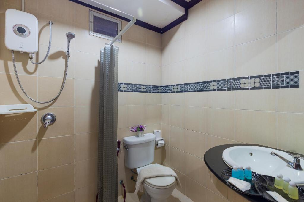 Семейный (Семейный люкс (для 3 взрослых и 1 ребенка)), Grand Orchid Inn