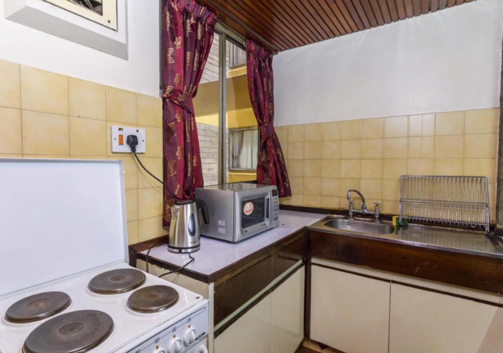 Chester Hotel and Suites Nairobi, City Centre CBD Room Type - One Bedroom Standard Apartment with Balcony And Kitchen