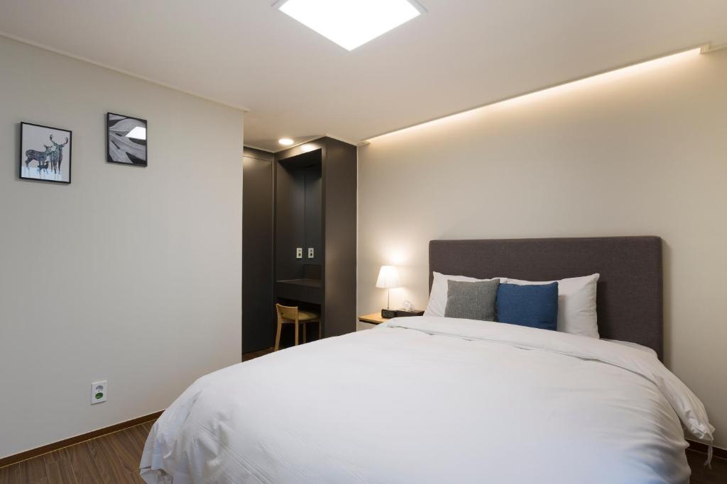 New Songtan Hotel - Tap to explore photos