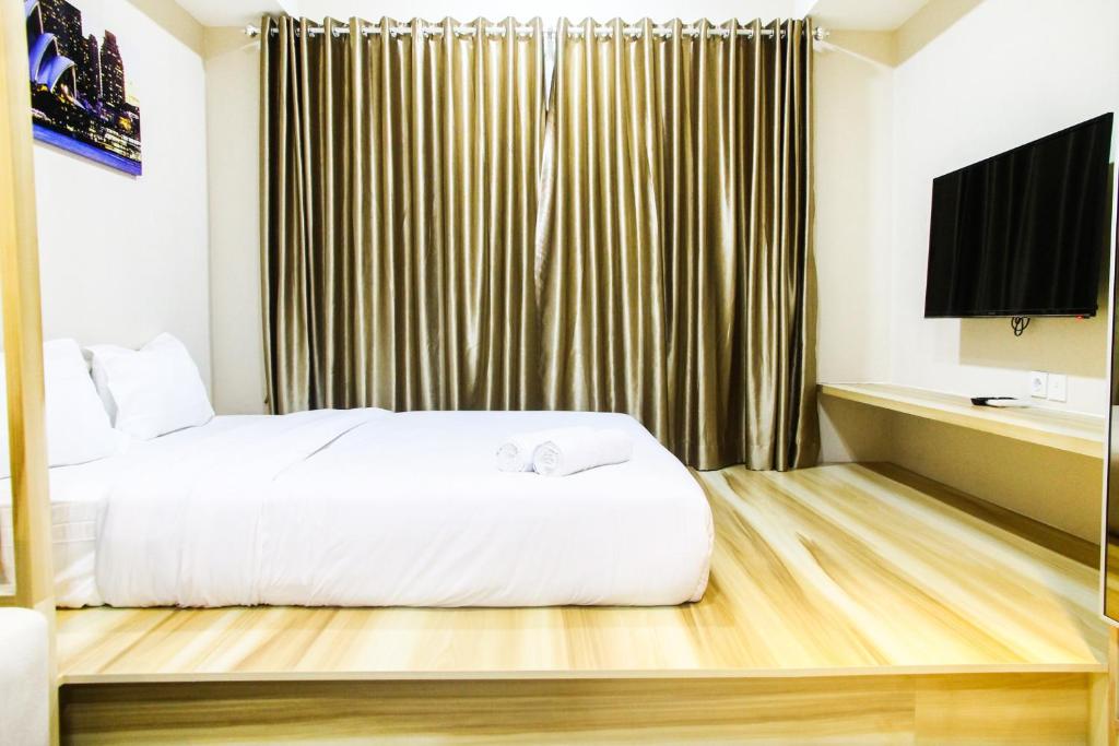 Modern Style The Oasis Studio Apartment with Comfortable Sofa By Travelio photo 2